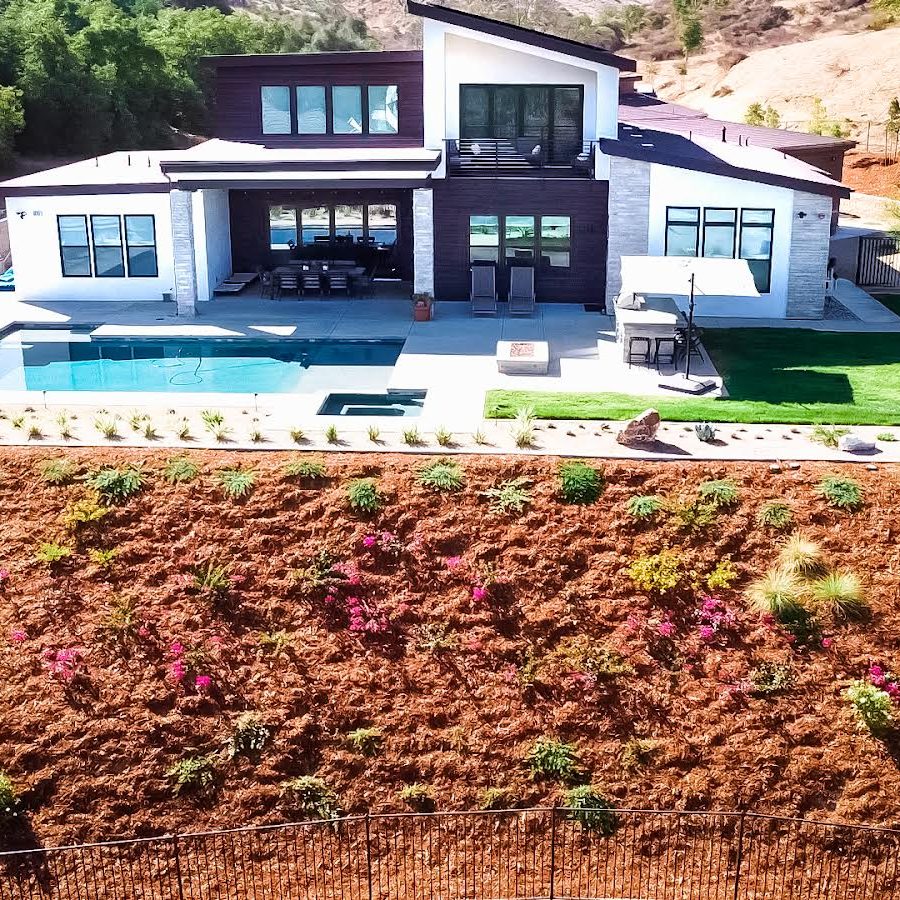 Aerial view of a SierraVistaLandscape backyard build with pool, pavers, and retaining-wall planters
